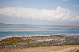 Sandy beach and sea, blue skies, Sedgemoor