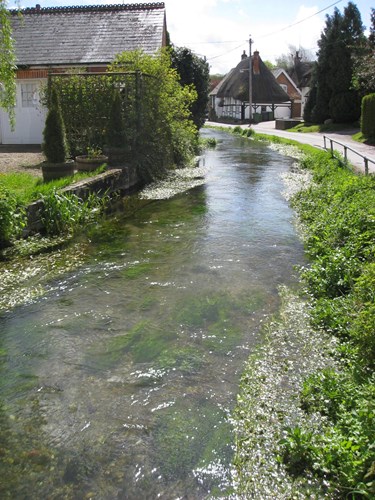 Watercourse flowing through rural village